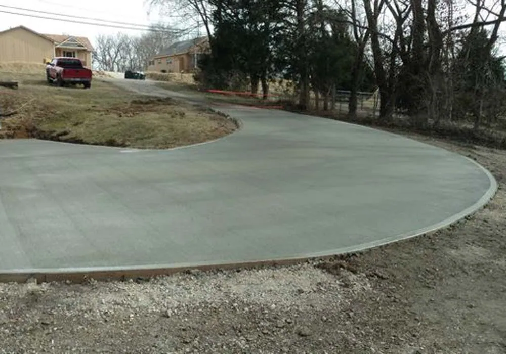 Concrete driveway contractor Kansas City — curved residential pour | Ford Concrete